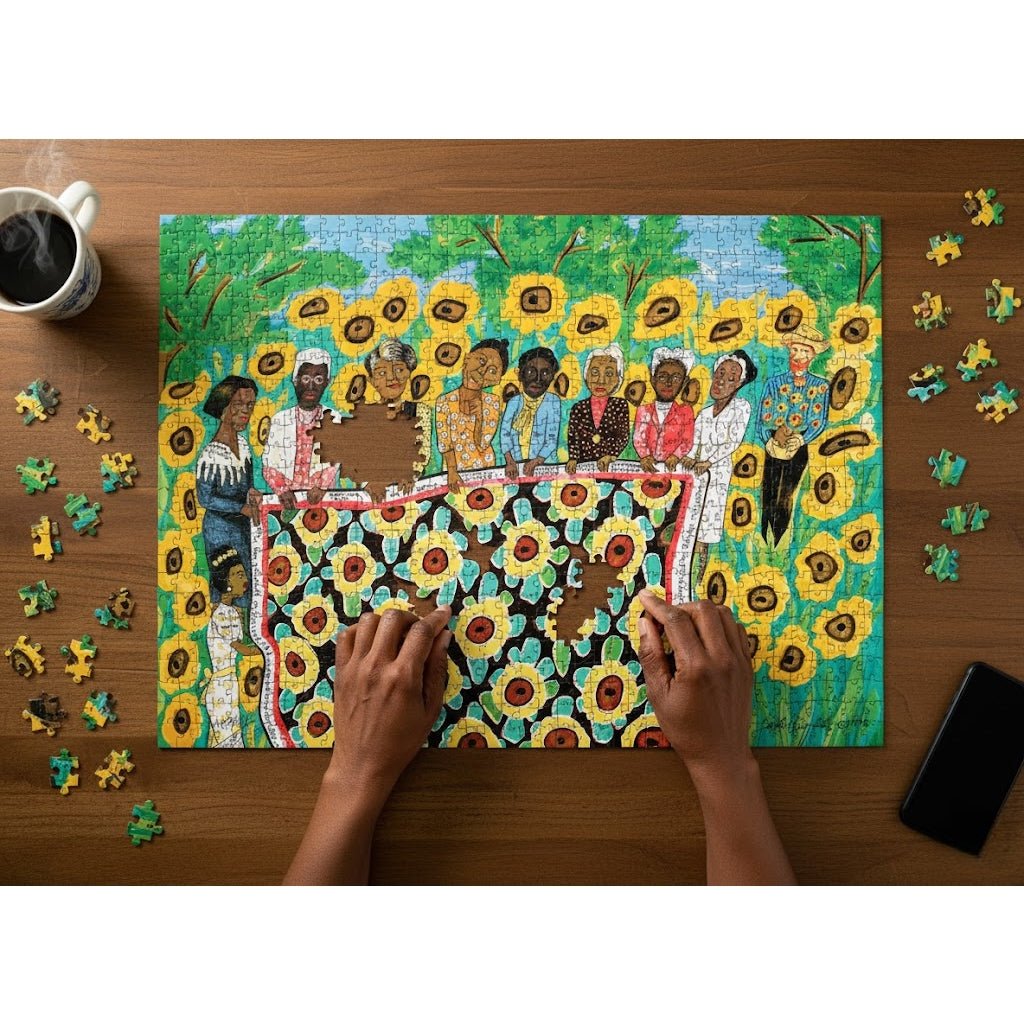 Sunflower Quilting Bee at Arles by Faith Ringgold: African American Jigsaw Puzzle (Lifestyle) - Person assembling a puzzle of a group of people with sunflowers on a wooden table.