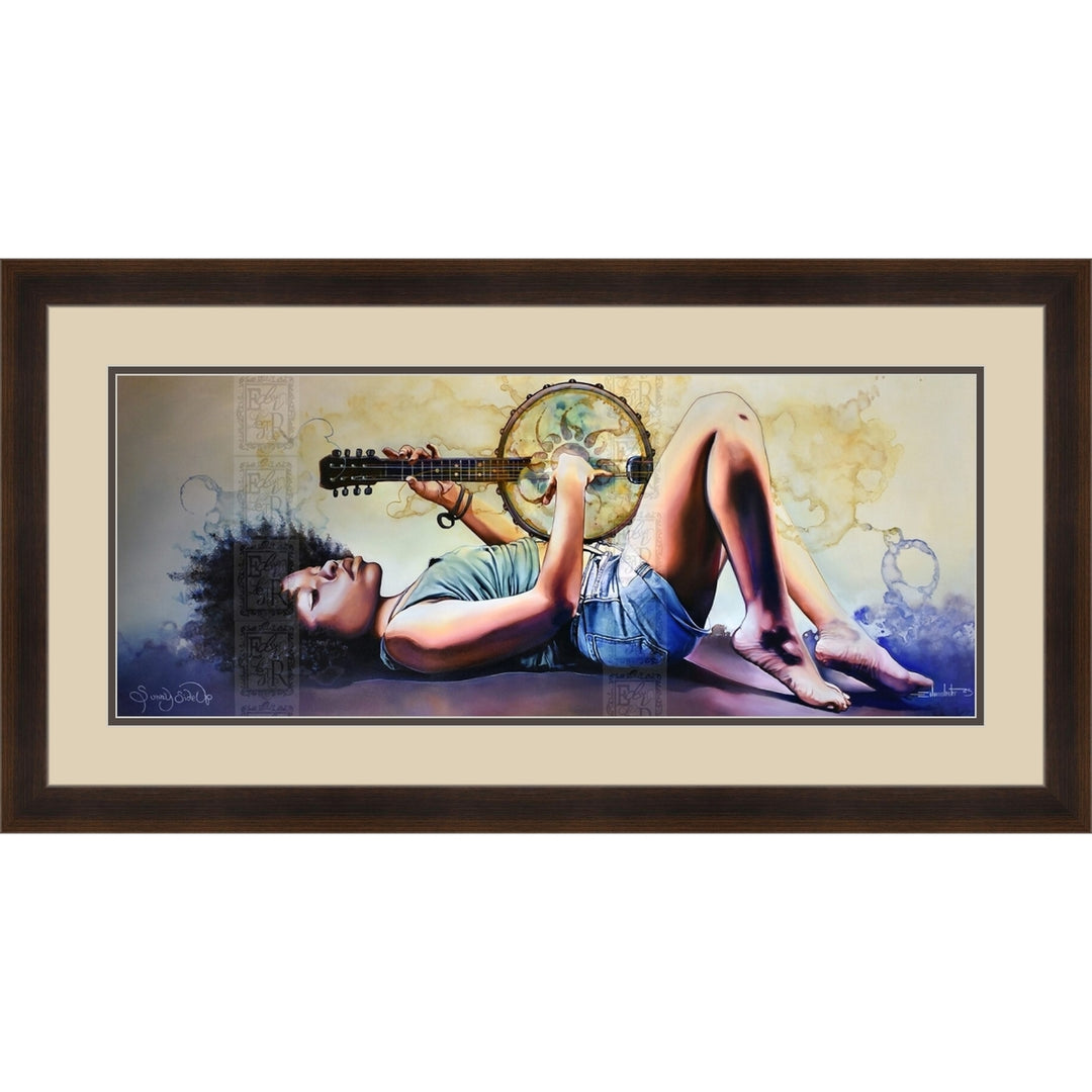 Sunny Side Up by Edwin Lester (Paper, Double Matted, Brown Frame) - A framed horizontal art print featuring a colorful painting of a woman lying down and playing a banjo, set against a light cream mat and a dark brown wooden frame.