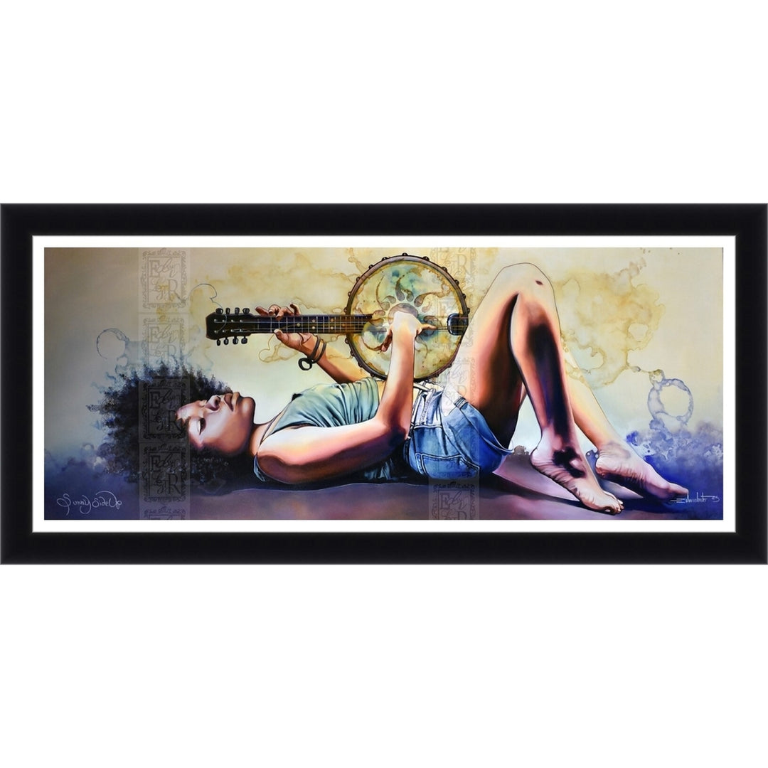 Sunny Side Up by Edwin Lester (Paper, Black Frame) - Framed wall art featuring a stylized painting of a woman reclining and playing a guitar, shown against a plain white background.