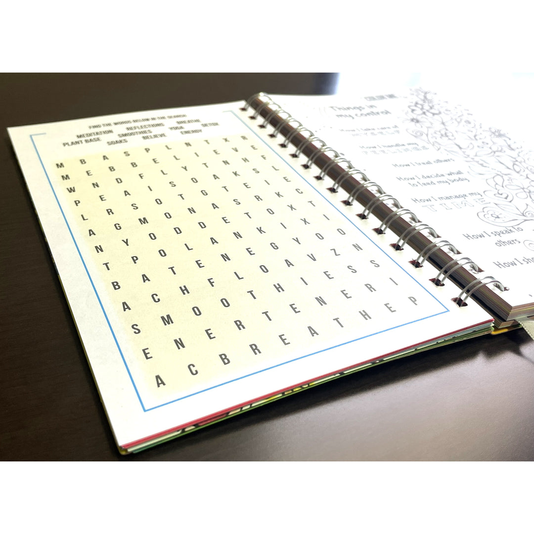 Be True to Yourself by Sylvia "Gbaby" Cohen: 2026 African American Weekly Inspirational Planner (Crossword Puzzle) - Open notebook with a word search page on a white background