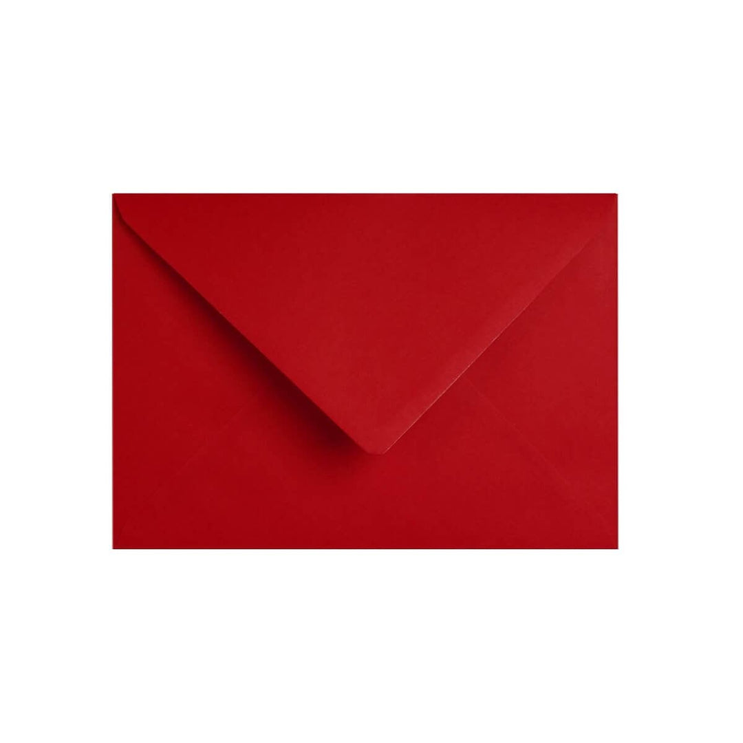 The Greatest Gift: African American Christmas Card Box Set by Janine Kai Robinson (Envelope) - A solid red paper envelope with a pointed flap, centered on a plain white background.