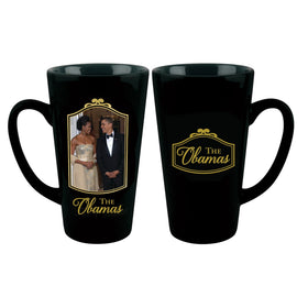 Class and Dignity: The Obamas Commemorative Ceramic Latte Mug (Main) - Two black ceramic coffee mugs shown on a white background, displaying the front and back designs. The front mug features a photo of The Obamas, and the back mug features a gold 'THE Obamas' logo.