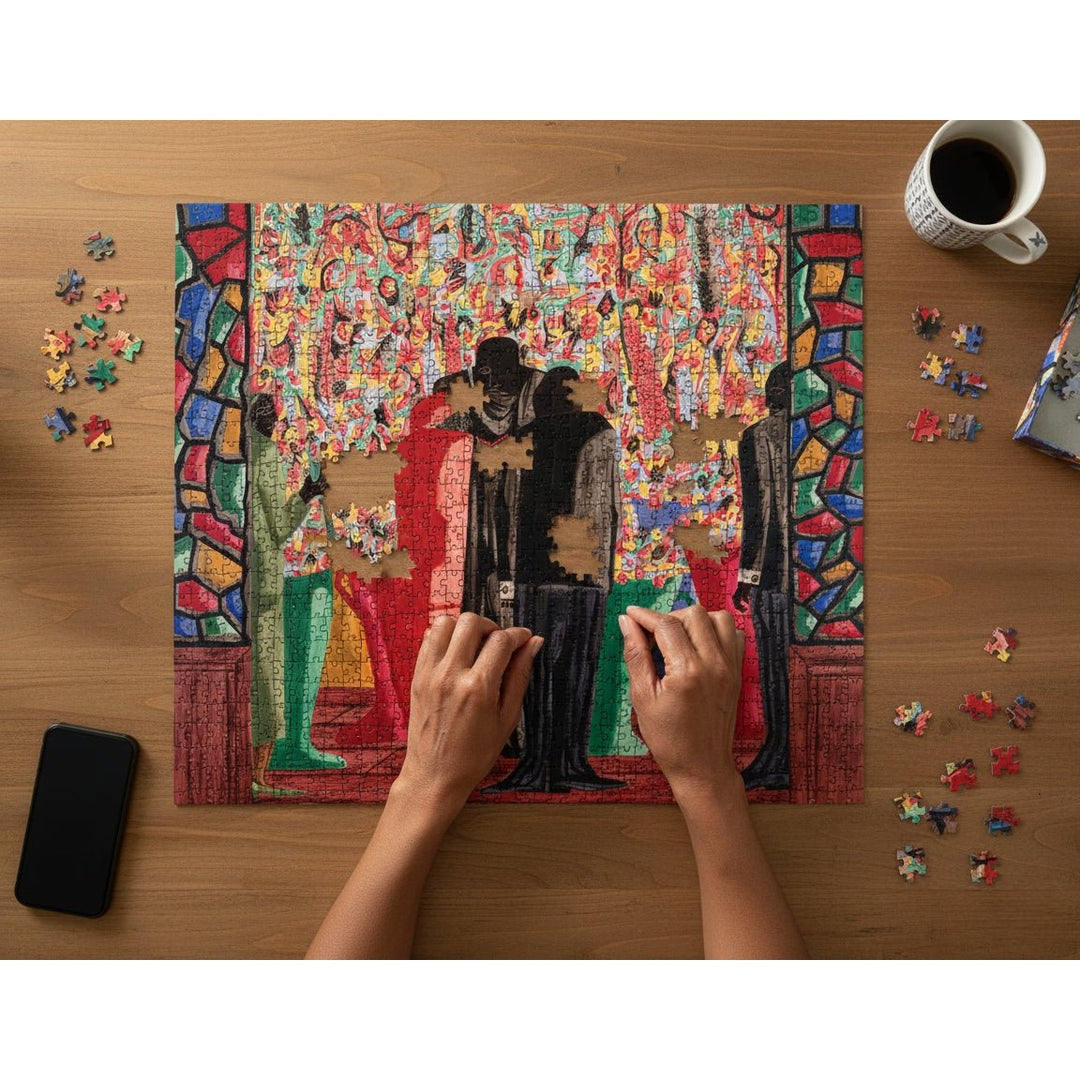 The Wedding by Jacob Lawrence: African American Jigsaw Puzzle (Lifestyle) - Colorful puzzle with a completed section of a famous artwork on a wooden table, with hands working on the puzzle.