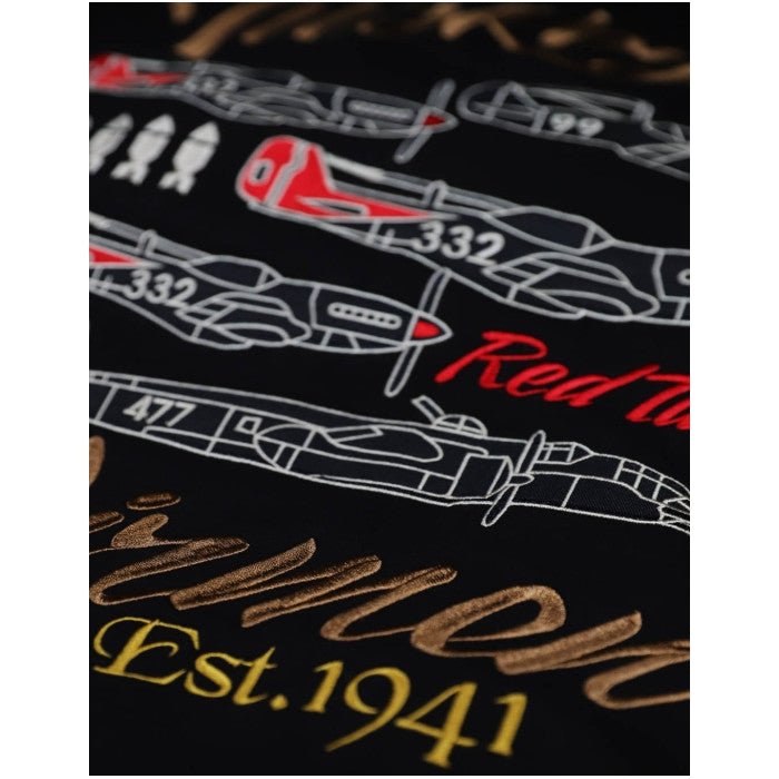 Tuskegee Airmen Squadron Patch Hooded Sweatshirt (Black, Back Detail) - Black shirt with red and white airplane designs and 'Red Tails' text on a dark background