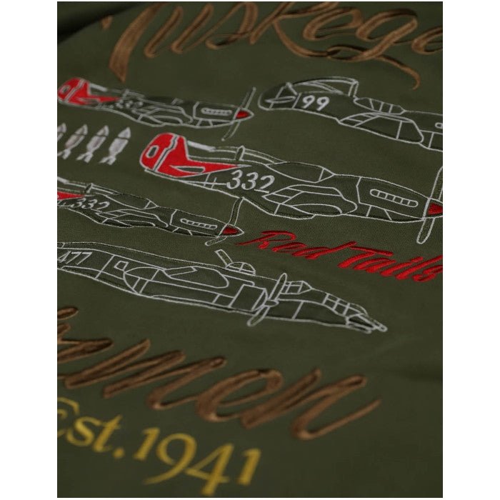 Tuskegee Airmen Squadron Patch Hooded Sweatshirt (Green, Back Detail) - Green fabric with embroidered airplane designs and text on a dark background
