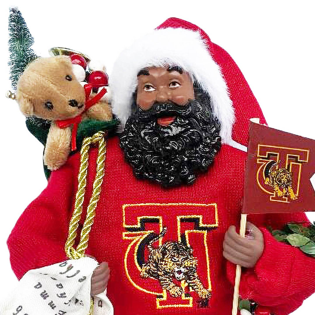 Close-up of Tuskegee Santa face, curly beard and Golden Tiger sweater logo