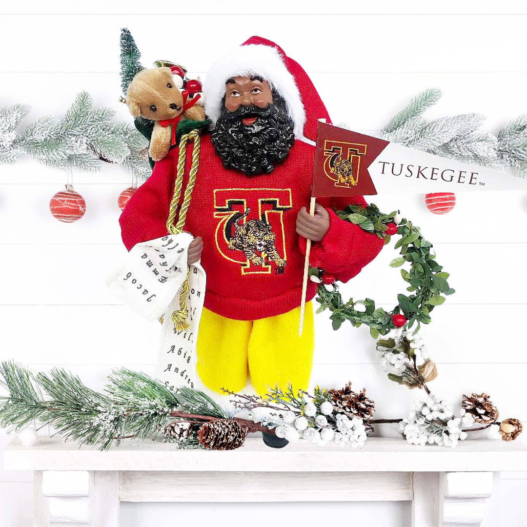 Tuskegee Golden Tigers Black Santa figurine on a Christmas mantel with garland