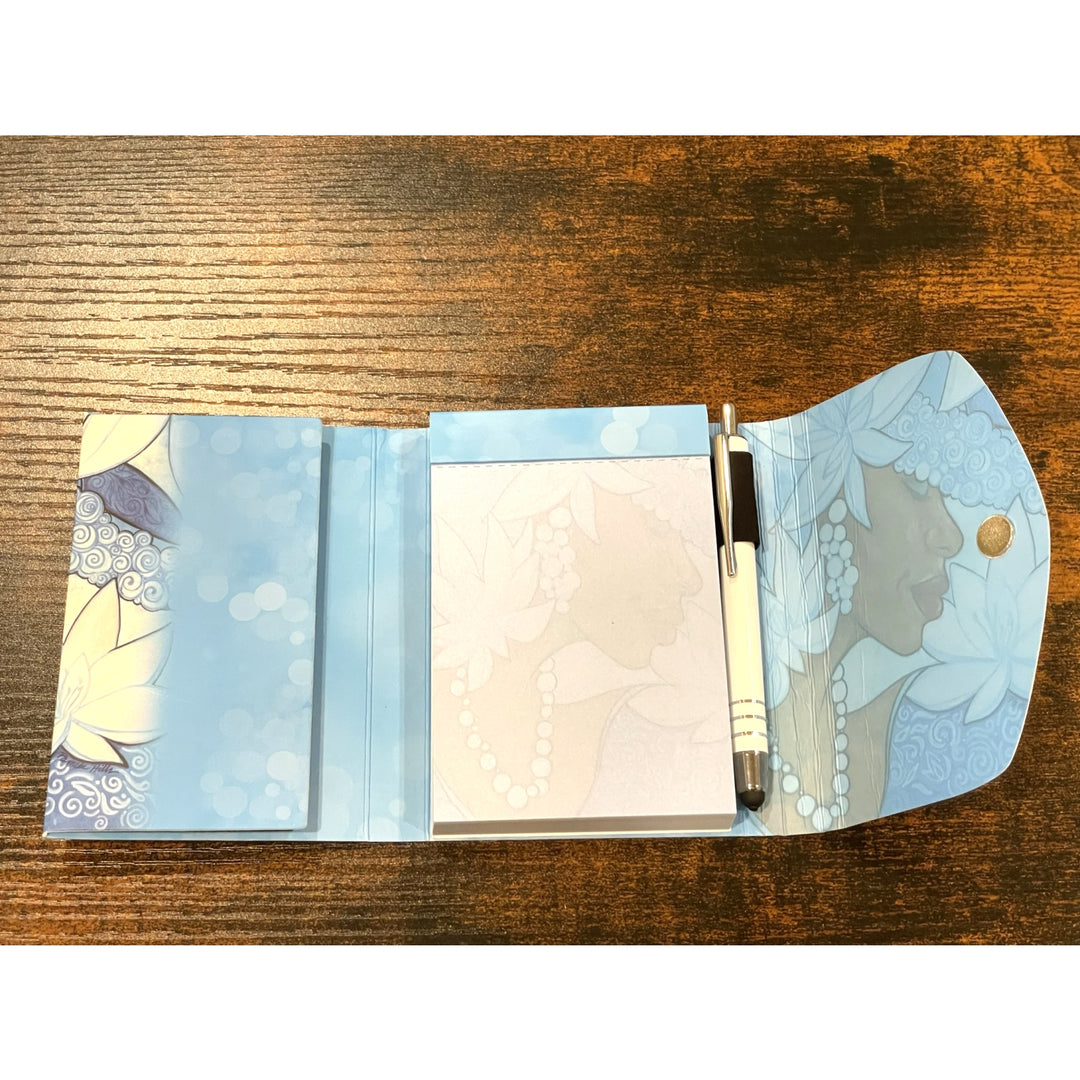 Winter Stylus Purse Pal by Pamela Hills (Interior) - Notebook with blue floral design on a wooden surface
