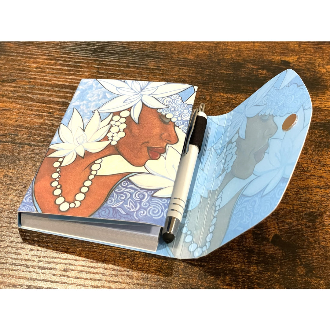 Winter Stylus Purse Pal by Pamela Hills (Lifestyle 2) - Notebook with artistic cover featuring a fox and floral design on a wooden surface.