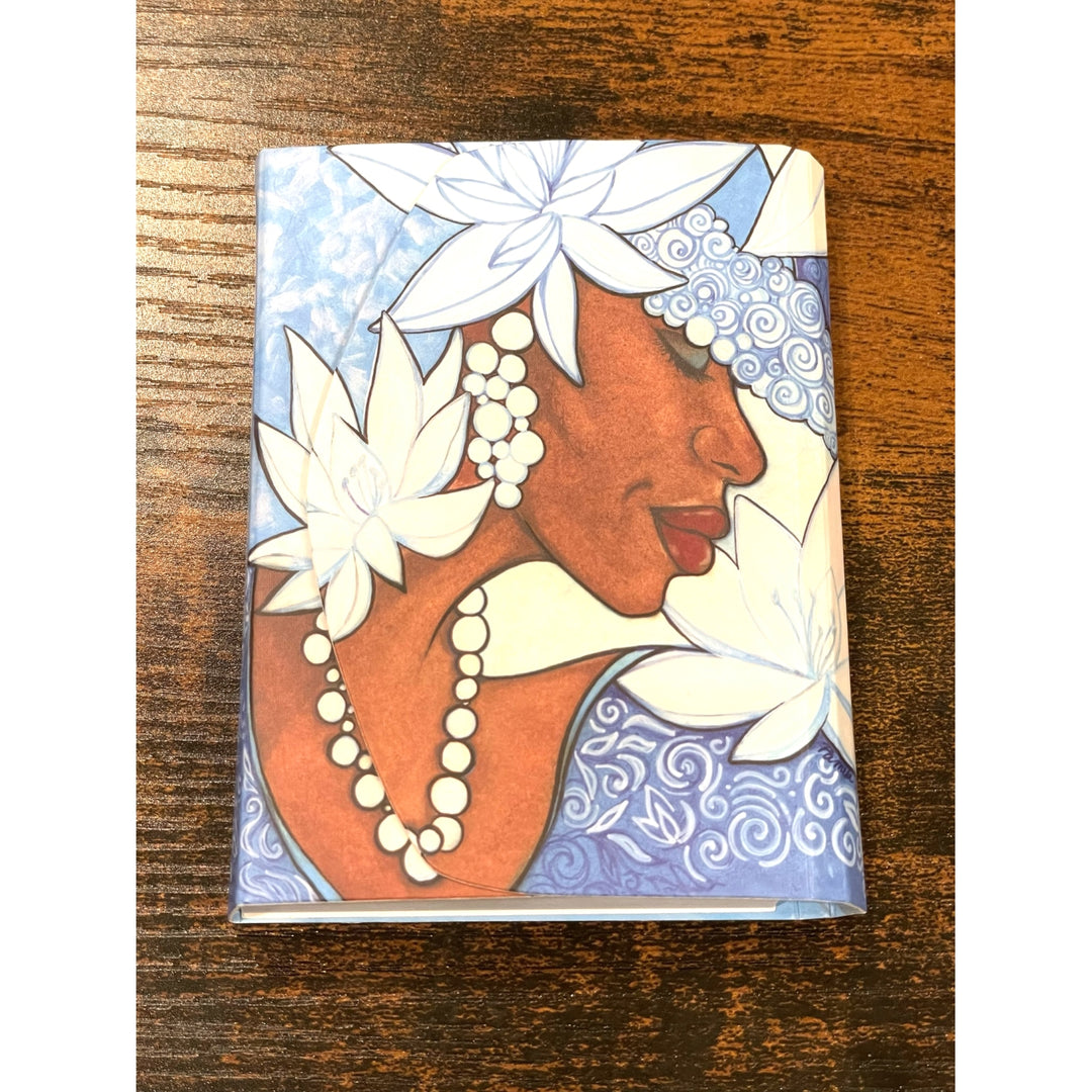 Winter Stylus Purse Pal by Pamela Hills (Lifestyle 3) - Notebook with artistic design of a woman's face and flowers on a wooden surface