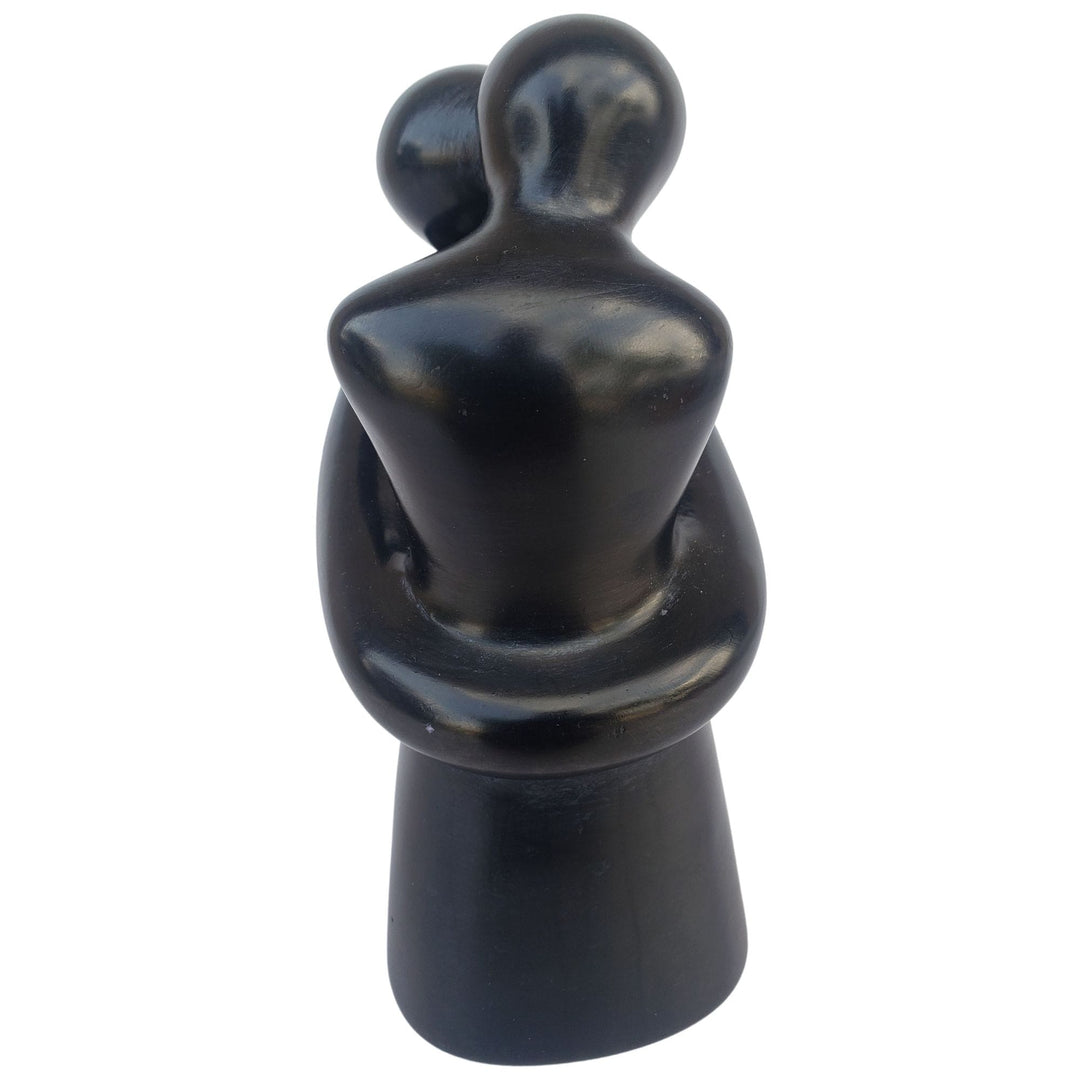 Wrapped in the Moment: Authentic African Soapstone Sculpture (Black)