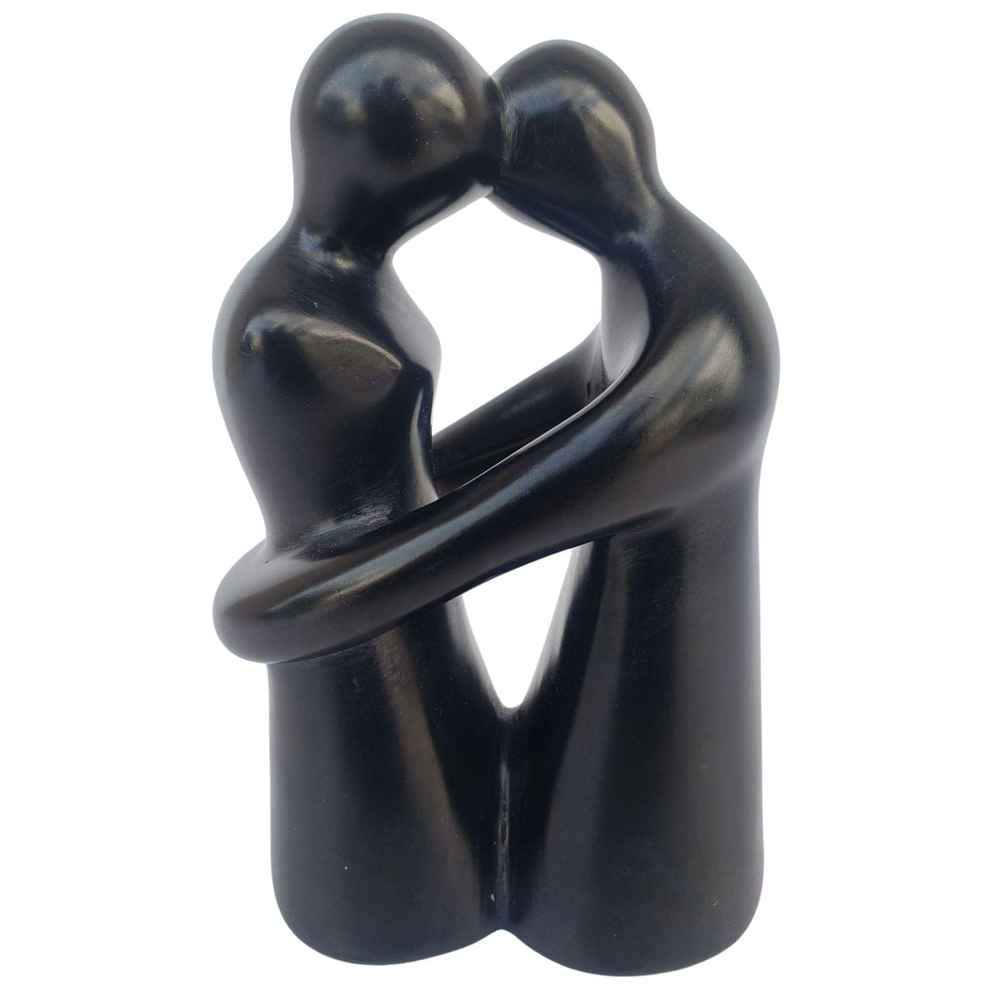 Wrapped in the Moment: Authentic African Soapstone Sculpture (Black)