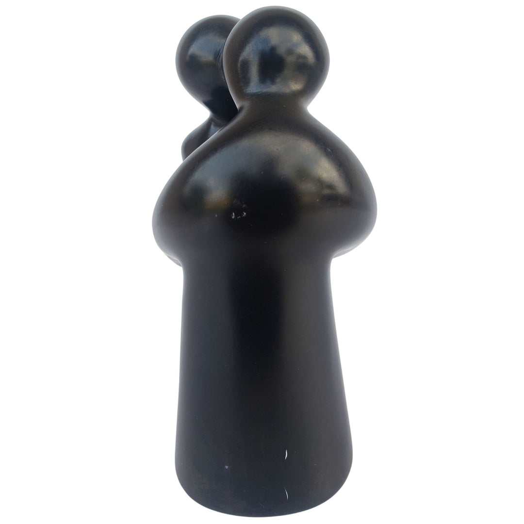 Wrapped in the Moment: Authentic African Soapstone Sculpture (Black)
